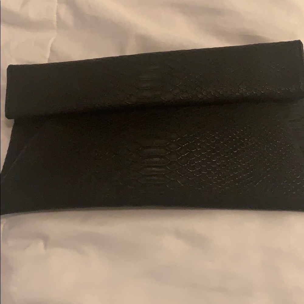 Urban Expressions Clutch never worn